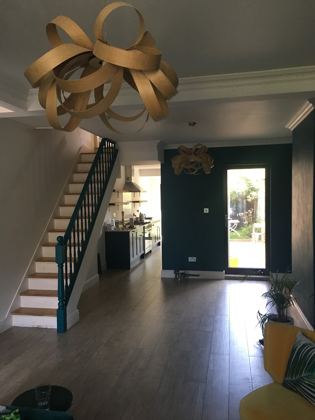 Refurbished hallway and staircase with feature lighting and new flooring — full house renovation by RJS Innovative Building, East London